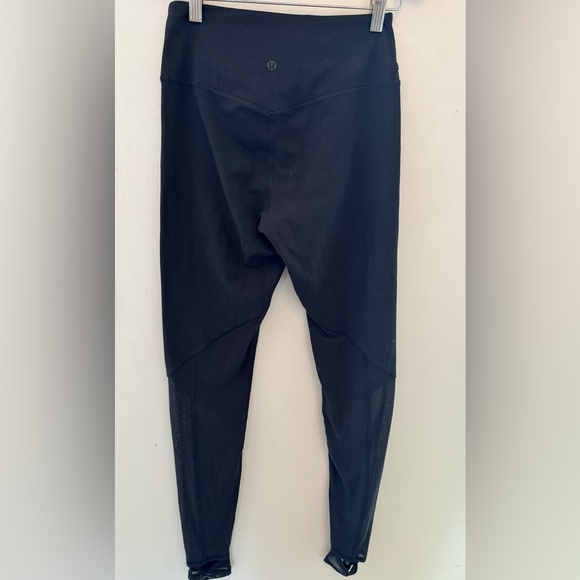 Lululemon Nulu and Crisscross Black Mesh Stirrup Tight. Size 8. - Picture 11 of 17